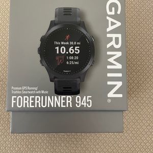 Garmin Forerunner 945 Premium GPS Watch NEW in box with extra watch band.